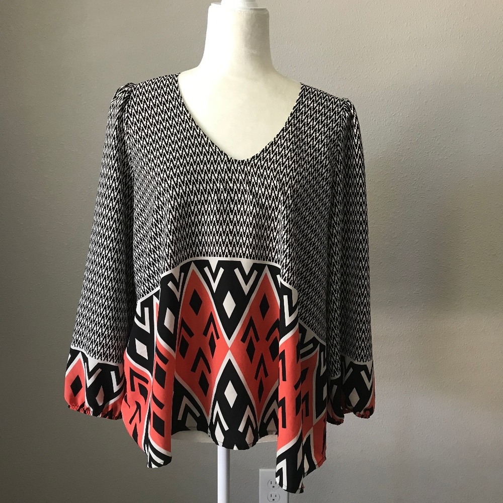 Anthropologie Black and Coral Geometric Blouse